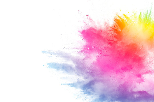 Freeze motion of colored powder explosions isolated on white background
