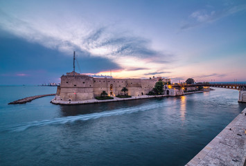 Taranto ancient fortress. Amazing sunset on city landscape. Italy panorama