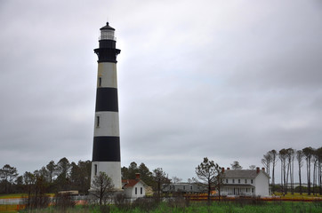 Bodie Island Lighthouse and keeper`s quarters in Cape Hatteras National Seashore, south of Nags...