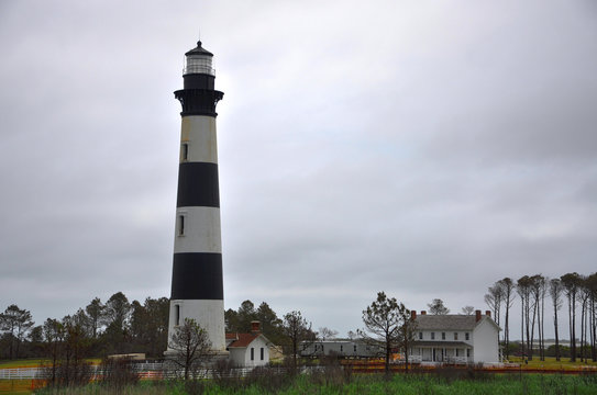 Bodie Island Lighthouse and keeper`s quarters in Cape Hatteras National Seashore, south of Nags Head, North Carolina, USA.
