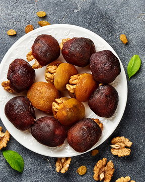Dessert of dried apricots with walnuts. Top view of Hashtak.
