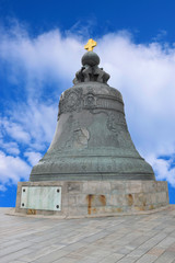 The Tsar Bell is a monument of the Russian foundry art of the 18th century against the blue sky and white clouds.