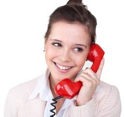 Woman Talking on Corded Phone - Isolated on White