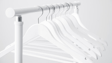 Empty wooden hangers for clothes