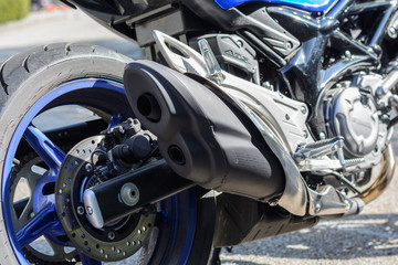 Detail of the motorcycle - exhaust and brake disc