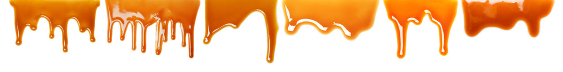 Set with delicious caramel sauce on white background