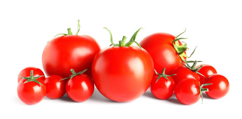 Tasty red tomatoes on white background