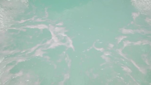 Water bubbles bursting in the pool