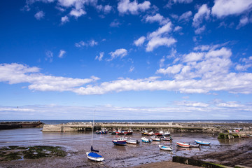 Fototapeta na wymiar Staithes, North Yorkshire, UK. A view of Staithes harbour.