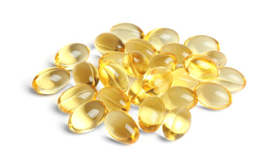 Cod liver oil pills on white background