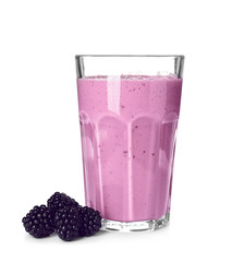Glass with blackberry yogurt smoothie on white background