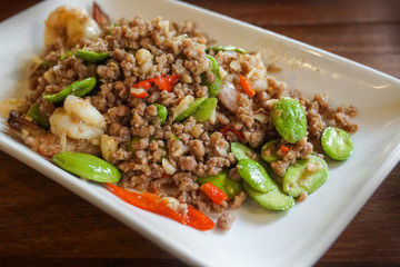 stir-fried twisted cluster bitter bean with shrimp thai traditional food