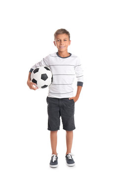 Adorable little boy with soccer ball on white background