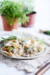 Dumplings with cabbage and mushrooms