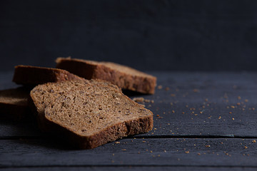 Bread on black wood 