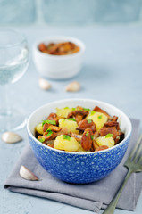 Chanterelle onion fried potatoes in a bowl