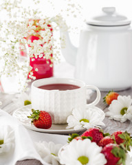 Fruit tea with fresh strawberries