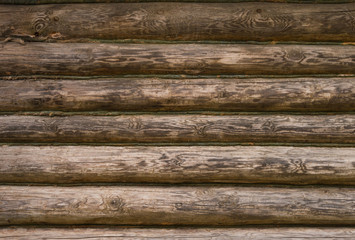 Obraz premium Old log wall of rural wood house 