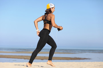 strong athletic girl holds a workout