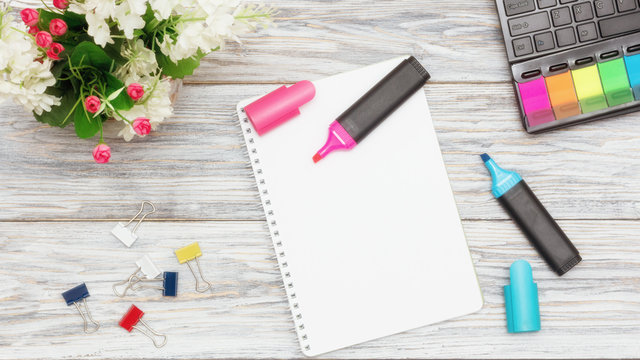 stationery, flowers and notepad