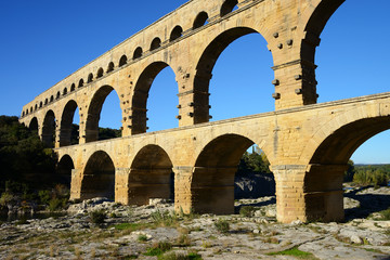 Fototapeta na wymiar Pont du Gard is an old Roman aqueduct near Nimes in Southern France