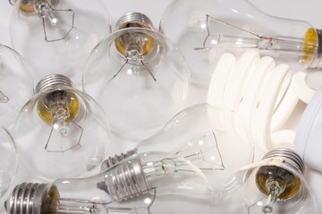One Lit Light Bulb with Unlit Light Bulbs