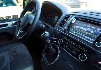 Closeup of a Car Audio System and Steering Wheel in a Modern Car