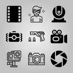 Simple 9 icon set of camera related webcam, video camera, film strip and action camera vector icons. Collection Illustration