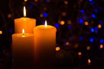 lit holiday candle