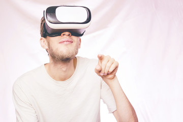 young man hands gestures in virtual reality vr glasses isolated