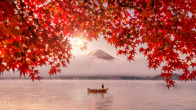 Red autumn leaves, boat and Mountain Fuji