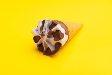 sweet potato flavor ice cream cone on a yellow background