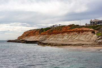 The iconic limestone cliff faces of the Port Noarlunga Beach South Australia on 23rd August 2018