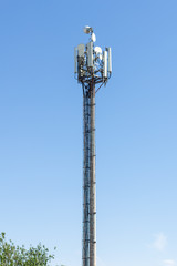 communication tower on blue sky background