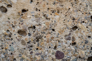 Stone wall background Wall made of cavern rock