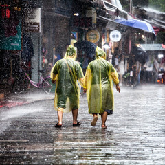 Walking down rainy Yangshuo west street