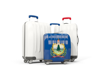 Luggage with flag of vermont. Three bags with united states local flags