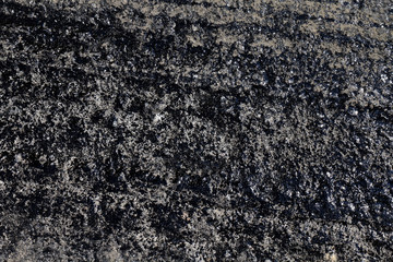 asphalt, texture asphalt at the road under construction, asphalt background, asphalt on concrete...