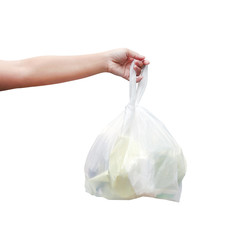 Hand is carrying waste plastic garbage bags isolated white background, Hand holding plastic garbage bags for dump waste