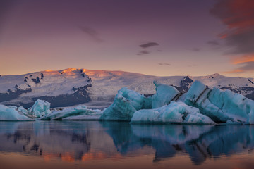 Icebergs in Jokulsarlon glacier lagoon. Vatnajokull National Park, Iceland Summer.Midnight Sun.