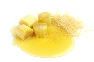sugar cane, honey bee mixed granulated sugar and heap of sugarcane cut, sugarcane piece and sweet...