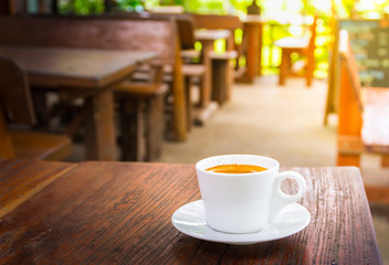 Hot fresh and fragrant coffee in white mug for morning refreshing.