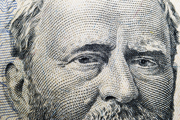 Close up view Portrait of Ulysses S. Grant on the one fifty dollar bill. Background of the money....