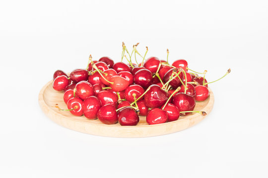 Red cherris on white background, fruit sweet and sour tasty good for health, fruit summer season,