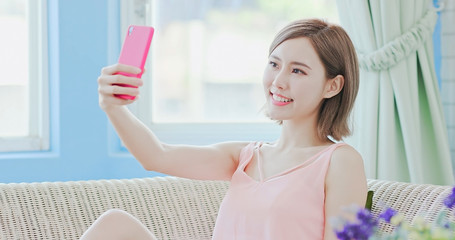 woman use phone selfie