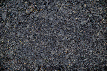 Asphalt texture, road texture. Crack asphalt background. dark grey asphalt pavement texture with small rocks.