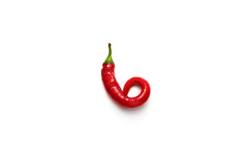 One red hot chili pepper on a white background. Flat lay, top vi
