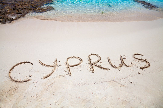 The inscription of Cyprus on the beach of sand