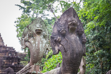 Fototapeta na wymiar Naga Head or big snake carve at Phanom Rung Historical Park built by rock at Phanom Rung mountain buriram province, Attractions in Thailand