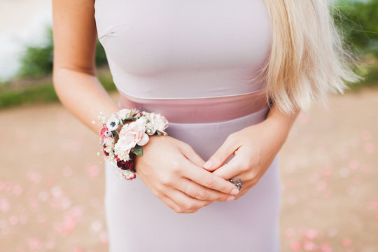 Flower bracelet on woman hands